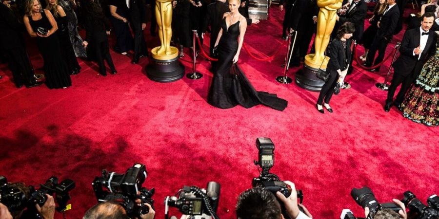 charlize-theron-oscars-red-carpet-photographers